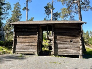Old dilapidated ancient wooden house in the village. Finland, 19th century