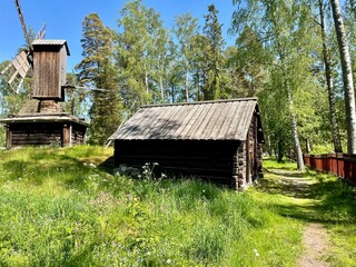 Old dilapidated ancient wooden house in the village. Finland, 19th century