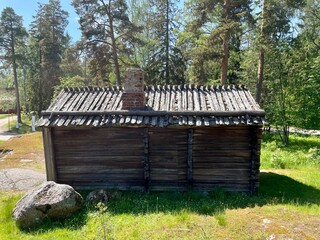 Old dilapidated ancient wooden house in the village. Finland, 19th century