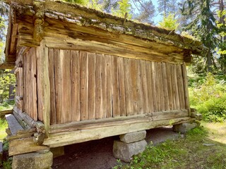 Old dilapidated ancient wooden house in the village. Finland, 19th century