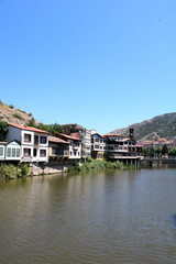 The magnificent river passes through the city of Amasya and the houses on the mountainside