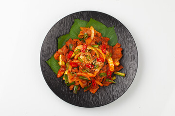   A dish made by stir-frying pork with various seasonings, then stir-frying it again with chives, onions, etc.