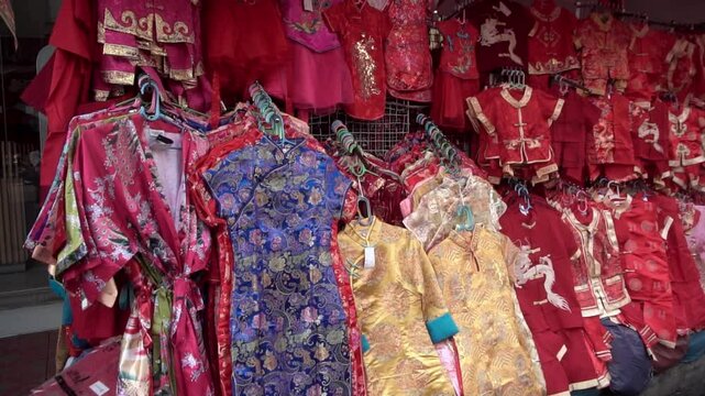 Chinese treditional dress for sale in market Lunar new year festival.
