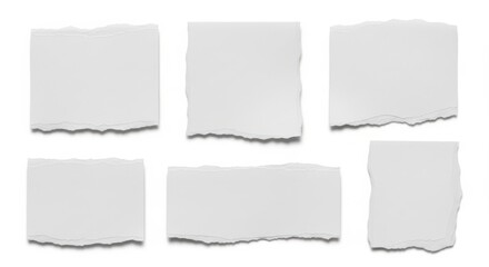 Arrangement of six torn pieces of paper on a plain light background view