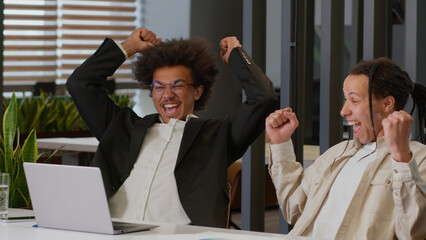 Two African American men guys multiracial multiethnic male businessmen business coworkers...