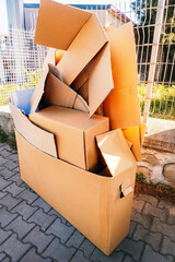 Cardboard boxes dum paper waste, crumpled corrugated cardboard boxes pile, recyclable paper waste on city street