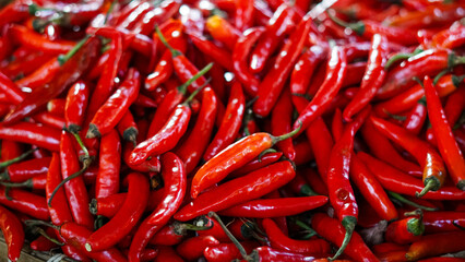 Vibrant Red Chili Peppers Background Texture