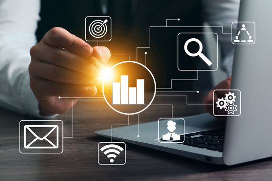 Digital marketing. Businessman using virtual screen with scheme at table, closeup - Powered by Adobe