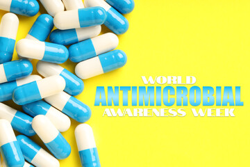 World antibiotic awareness week. Many pills on yellow background, flat lay