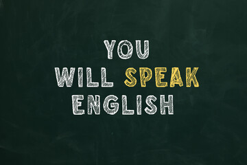 You Will Speak English inscription on green chalkboard. Language course