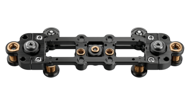 Black metal modular construction with multiple holes, screws, springs, and fittings.