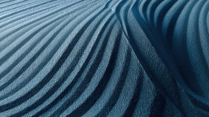 Smooth blue sand forming concentric ripples revealing meditative pattern, representing tranquil landscape with elegant minimalist texture and serene natural symmetry