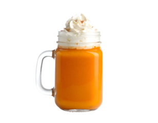 Pumpkin beverage in glass mug with whipped cream topping. Transparent background