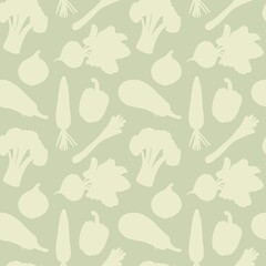 Seamless pattern with silhouettes of vegetables in green colors