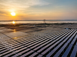 Solar photovoltaic power plant at sunset