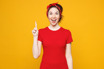 Young insighted smart happy proactive woman she wearing red t-shirt casual clothes holding index...