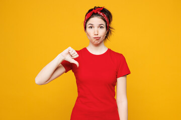 Young sad disappointed dissatisfied displeased woman she wearing red t-shirt casual clothes showing...