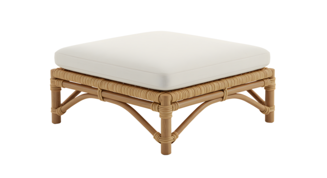 Elegant square ottoman with a soft white cushion on a woven rattan base, set against a neutral background in a cozy living space