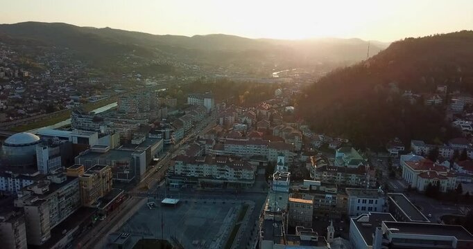 Aerial footage of Ramnicu Valcea downtown, Romania at sunset