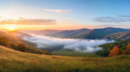 Majestic Sunrise Over Misty Mountains: A Serene Autumn Landscape
