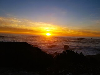 sunset over coastline