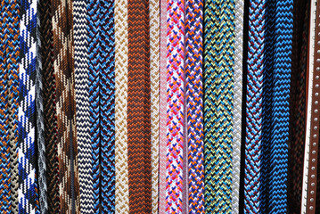 Colourful Patterned Textile Material Hanging on Outdoor Rail 