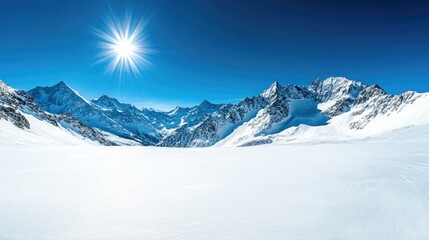 Obraz premium Majestic Snow-Capped Mountains Under Bright Sun in Pristine Landscape