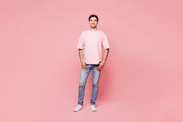 Full body young smiling happy cheerful fun confident Caucasian man he wear t-shirt casual clothes...