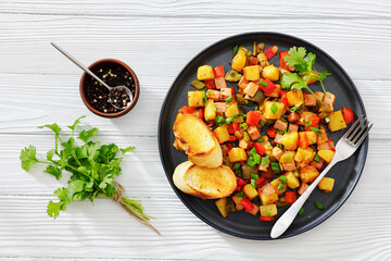crispy fried cubed potatoes with ham, bell peppers