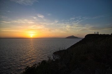 The hills near the Temple of Poseidon fade during a spring sunset.