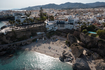 Nerja Balcony of Europe: Coastal Town and Pristine Beaches
An aerial panorama of Nerja's charming white-washed town, rugged cliffs, and sun-drenched beaches along the azure Mediterranean sea