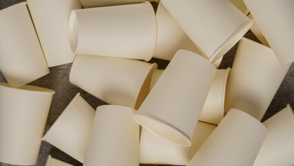 Scattered White Disposable Paper Cups Pile