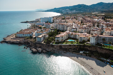 Nerja: White Village Charm on the Mediterranean Coast

An aerial panorama of Nerja, a picturesque...