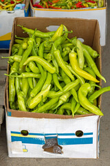 Green Peppers Produce in Crate at Farmers Market