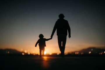 Fototapeta premium A heartwarming scene of a father, child, and the majestic sunset in nature, serves as a perfect representation of travel, holiday, or a weekend getaway, where the father is seen holding the child,