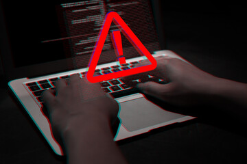Cyber attack alert notification. Red warning sign and programming code on virtual screen. Hacker...