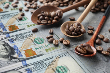 Coffee price rising. Dollars and spoons with roasted coffee beans