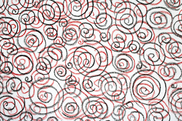 Crayon wiggly swirl drawing lines in different colours on white background