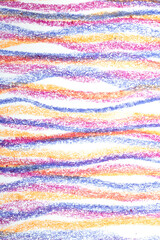 Crayon wiggly drawing lines in different colours on white background