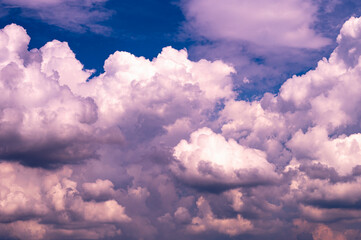 Large cloud filled sky with a blue sky in the background