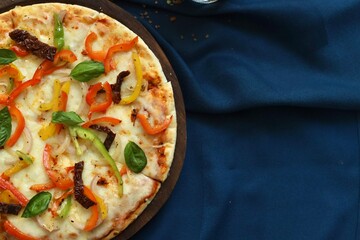 Pizza with vegetable like bell pepper & capsicum and cheese