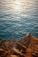 Sunset Over Rocky Coastline
