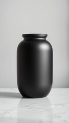 Monochrome Aesthetics: Stylish Black Vase Set Against White Wall
