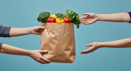 Close up Hand hold Fresh Healthy vegetable and fruit at brown paper bag on blue background. Grocery Shopping Healthy and diet food photo concept