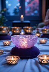 Seven glowing Tibetan singing bowls and a purple crystal bowl with lit candles create a serene atmosphere