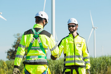 Team of electrical engineer is perform the inspection and maintenance of electric generating windmill turbine.