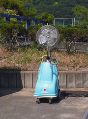 A fan prepared at the entrance of the construction site.