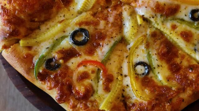 Pizza with cheese in a restaurant or cafe background 