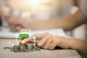 Saving Money with Coins and Digital Button Concept