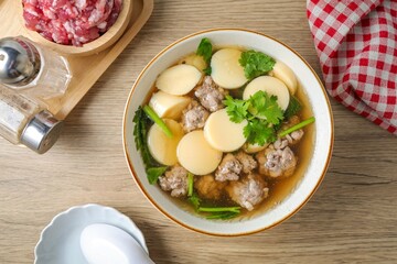 Home made Clear Soup with Bean Curd and Minced Pork ,Clear Soup with Egg Tofu ,vegetable and Minced Pork ball ,thai food,Thai call kang jued tao hoo moo sab	